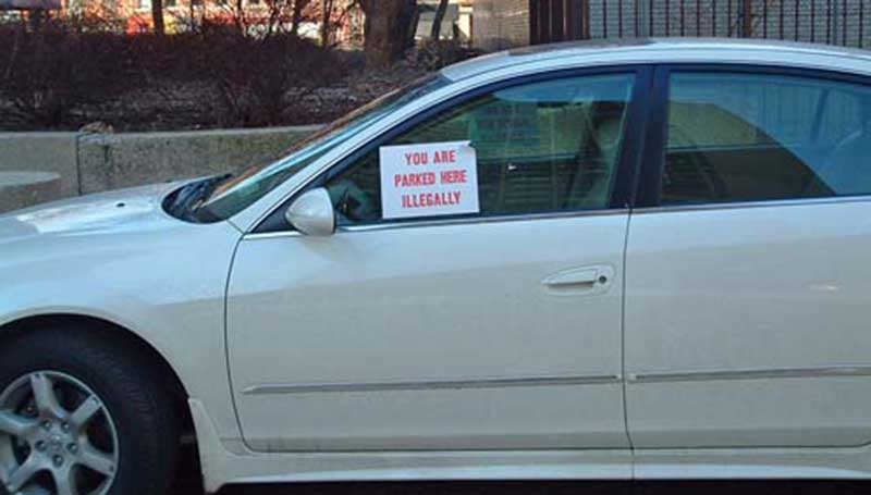 no parking sticker on a car